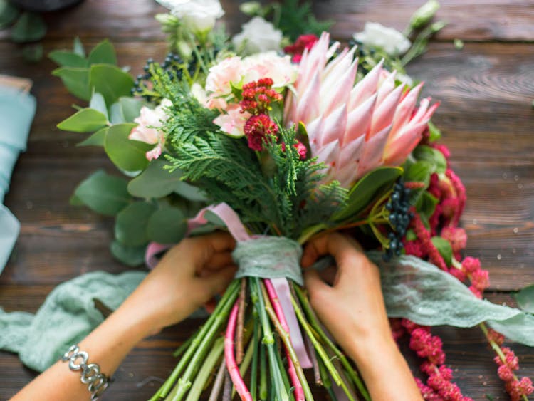 A lovely bouquet is wrapped in ribbon for use in a Missouri wedding